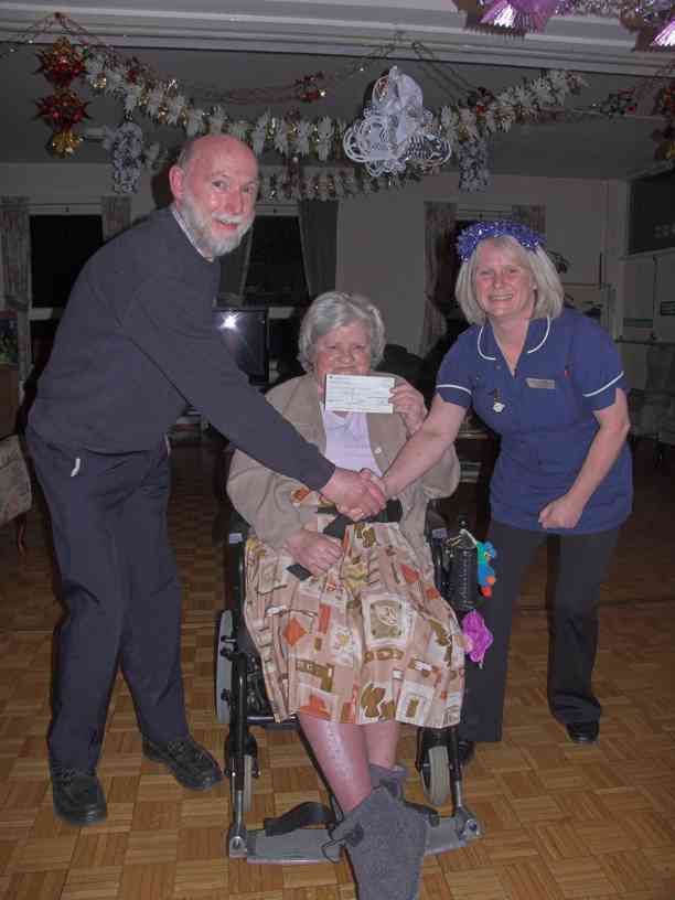 The presentation of £900 to Cotebrook House The presentation of £900 to Cotebrook House