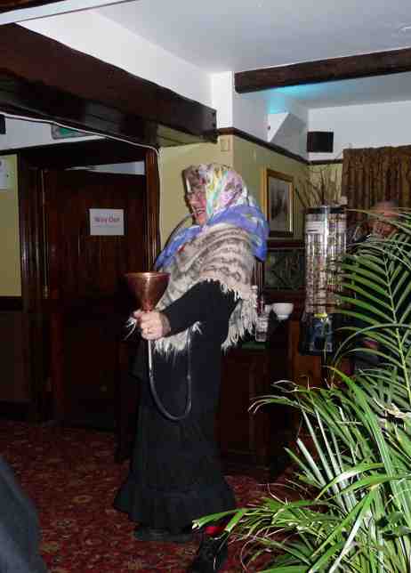 The Old Woman sampling the cure The Old Woman sampling the cure