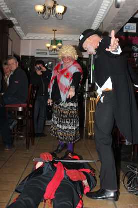 The Old Woman asking for her 'son' to be cured in the Market Tavern in Altrincham. The Old Woman asking for her 'son' to be cured in the Market Tavern in Altrincham.