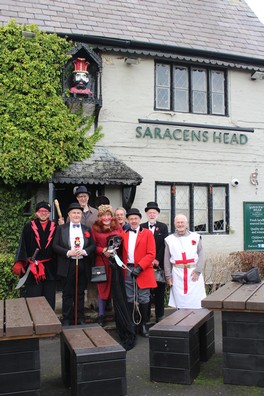 Click for larger view The Gang outside the Saracen's Head prior to going to perform at the Church. (Photo: L. Armstrong/M. Seyler)